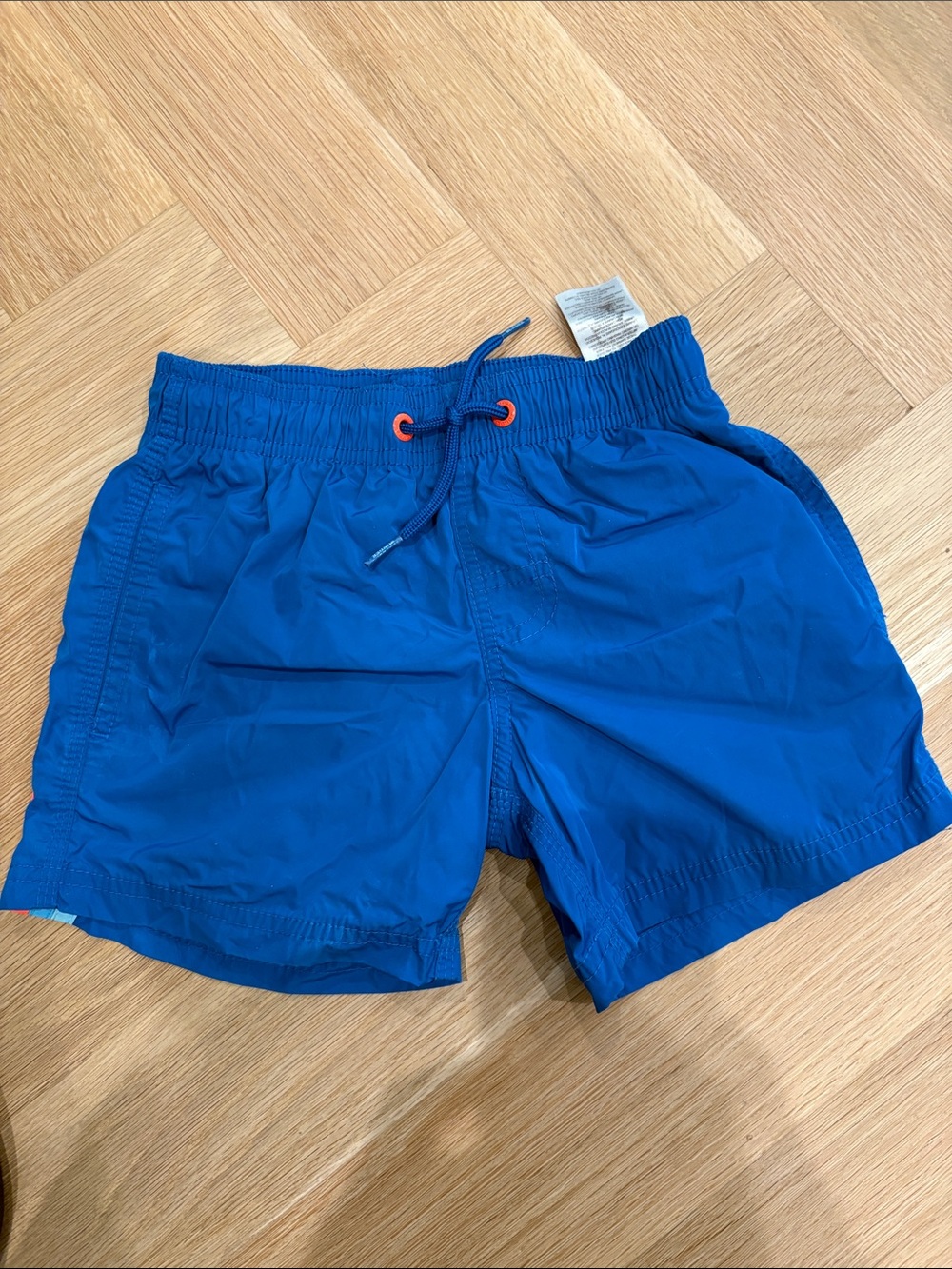 Sundek Bright Blue Boys Swim Shorts with Orange and blue back details